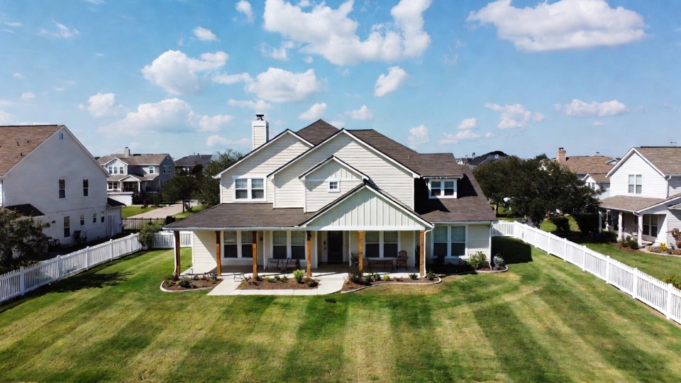 Freshly mowed lawn with visible mowing stripes in Rockwall