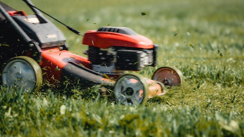Close-up of precision lawn mowing equipment at work